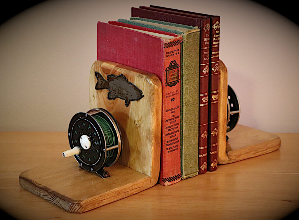 Book Ends with a vintage fly fishing reel and a rustic bass accent.